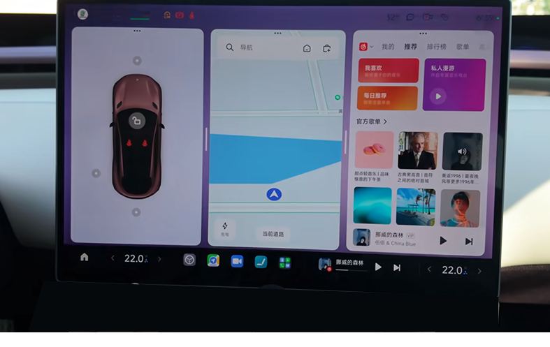 The centre screen on its home layout: the car, the map and music side by side, with the temperature 22.0 sitting small in the dock along the bottom