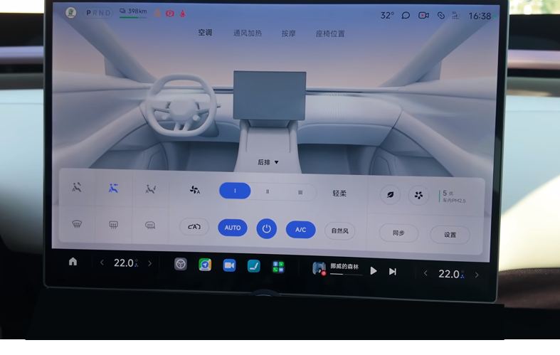 The climate panel now covers the lower half of the centre screen, with seat heating, fan speed, AUTO, A slash C and air quality controls laid across it